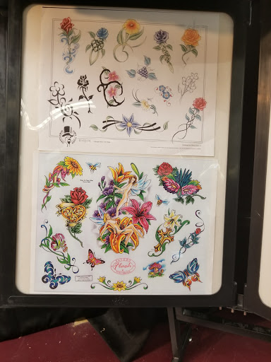 Tattoo Shop «Infamous Ink Tattoo and Piercing», reviews and photos, 410 Four Seasons Blvd #202e, Greensboro, NC 27407, USA