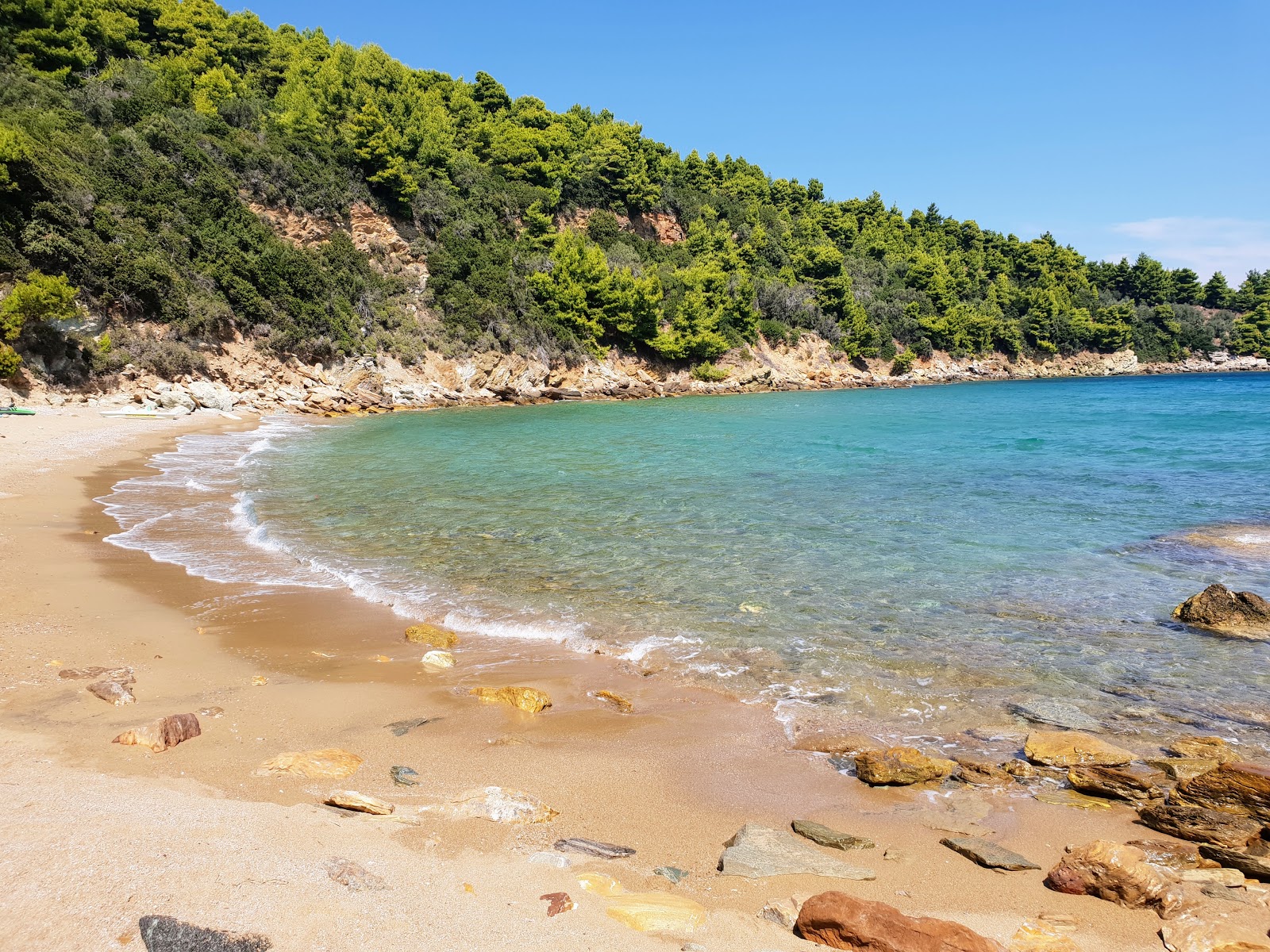 Foto van Vromoneri beach met turquoise puur water oppervlakte