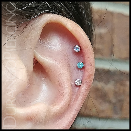 Explore 3 cross tattoo ideas, creative tattoo ideas in Durango, available at Durango Professional Piercing