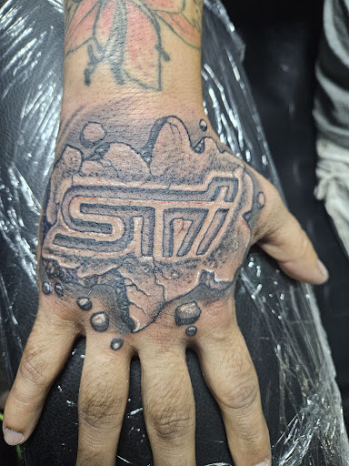 Explore tnt tattoo ideas, creative tattoo ideas in Angola, available at Hoodlum Ink