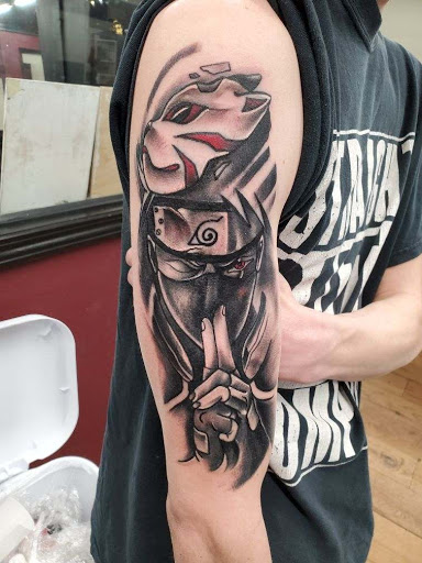 Find tattoo ideas for tummy tuck scars for your next unique tattoo in Tulsa at Midtown Tattoo Co.