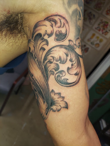 Explore angel tattoo sleeve ideas, creative tattoo ideas in Odessa, available at Little Dragon Tattoos Studio