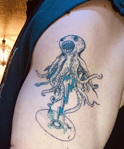 Explore under breast tattoo ideas for females, creative tattoo ideas in Orlando, available at Fine Ink Studios Tattoos