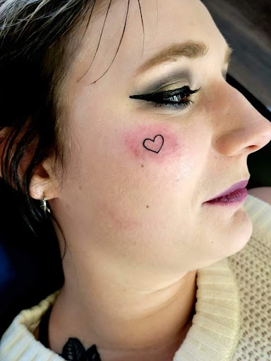 Find simple heart tattoo ideas for your next unique tattoo in Warrensburg at Altered Visions Tattoo Studio