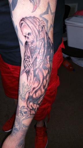 Explore half sleeve tattoo ideas black and grey, creative tattoo ideas in Centre, available at Ink You Tattoos