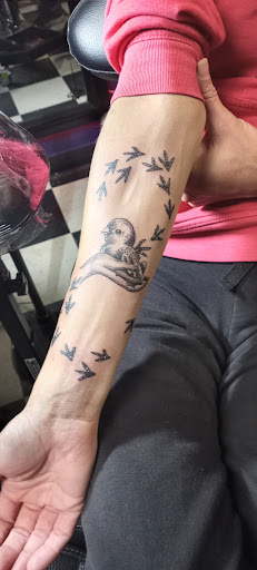 Explore side tattoo ideas for females, creative tattoo ideas in Prudenville, available at Dark Horse Tattoo Studio