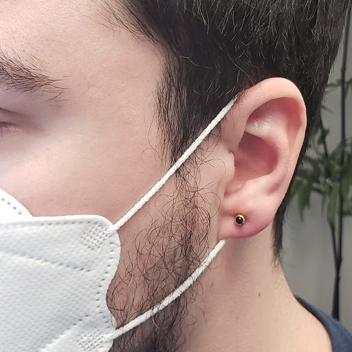 Explore cover up tattoo ideas on hip, creative tattoo ideas in Bellevue, available at Just Your Ears Piercing & Permanent Jewelry Studio