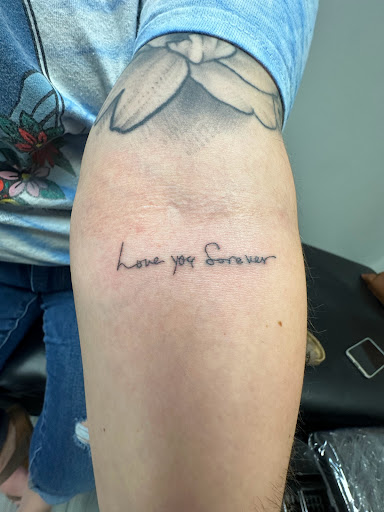 Explore two sons tattoo ideas, creative tattoo ideas in Peoria, available at The Ink Bar