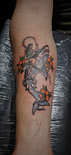 Explore small book tattoo ideas, creative tattoo ideas in Weatherford, available at Weatherford Tattoo Co.