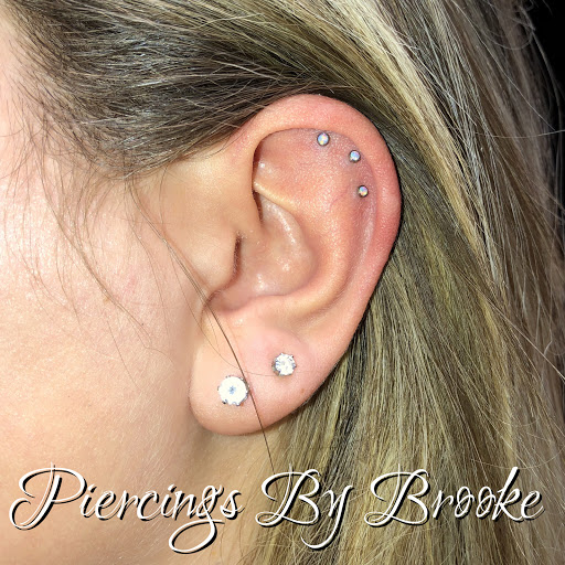 Explore spine tattoo cover up ideas, creative tattoo ideas in Covington, available at Cupid Slave Tattoo Company