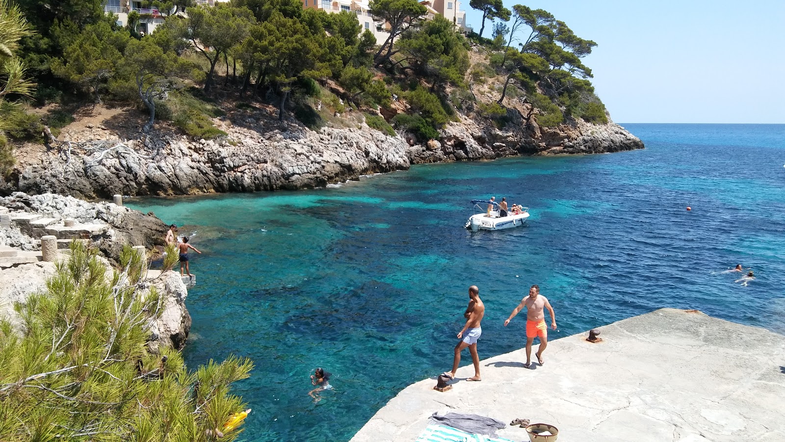Photo of Cala Serch with light fine pebble surface