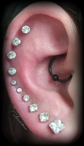 Explore tattoo cover up ideas for forearm, creative tattoo ideas in Green Bay, available at Colourbox Body Piercing Llc