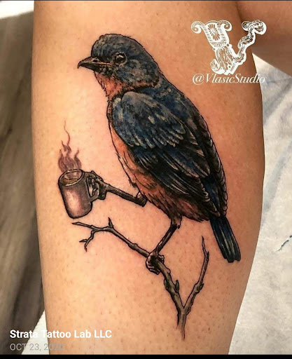 Explore broken chain tattoo ideas, creative tattoo ideas in Yucca Valley, available at Strata Tattoo Lab LLC