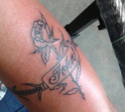 Tattoo Shop «Magnum Tattooing», reviews and photos, 2317 Division Ave S, Grand Rapids, MI 49507, USA