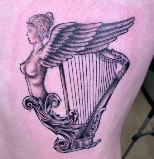 Explore womens hand tattoo ideas, creative tattoo ideas in Kenosha, available at Kenosha Tattoo Company