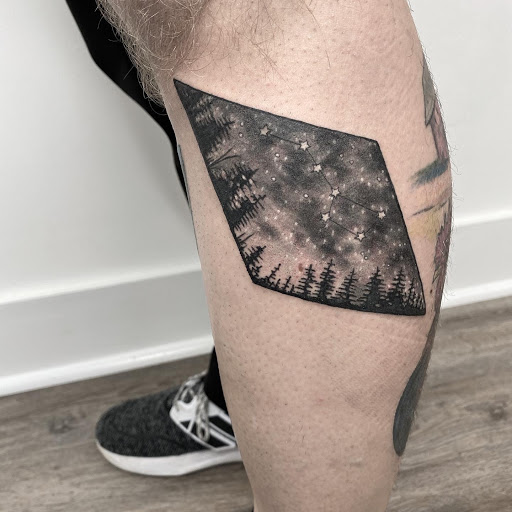Explore colorful flower tattoo ideas, creative tattoo ideas in Lancaster, available at MermGoddess Tattoo Studio & Gallery