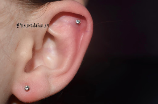 Explore tattoo ideas for belly, creative tattoo ideas in Hopkinsville, available at Piercings By Kaitlyn at Rising From Ruins Tattoo