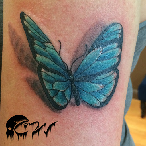 Explore mens travel tattoo ideas, creative tattoo ideas in Clarksville, available at Chris Wallace Tattoos