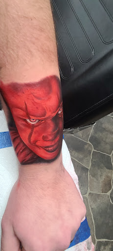 Explore wrap around wrist tattoo ideas, creative tattoo ideas in Stetsonville, available at Solace Ink Company LLC