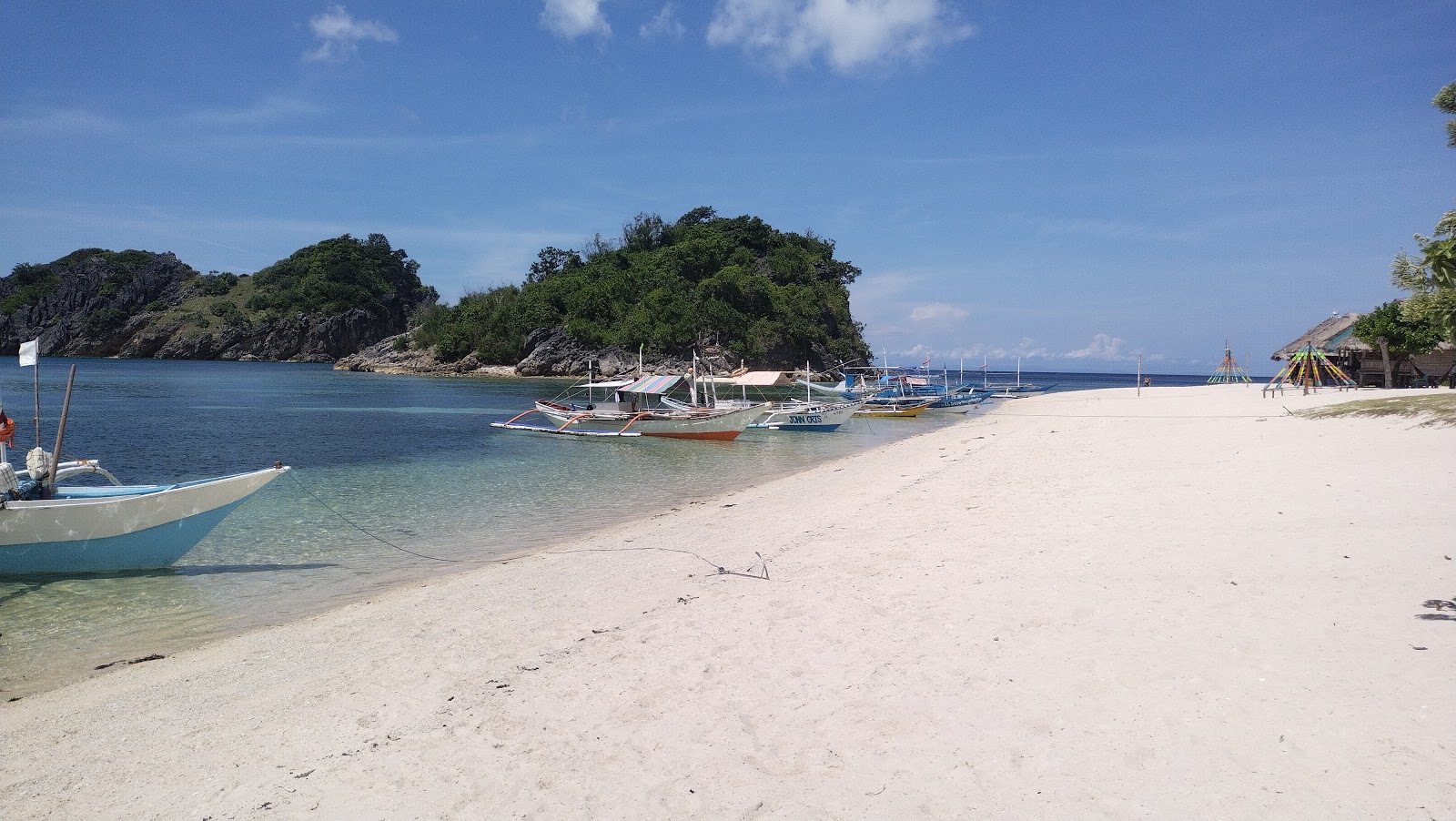 Foto af Buyayao Island Resort med hvidt fint sand overflade