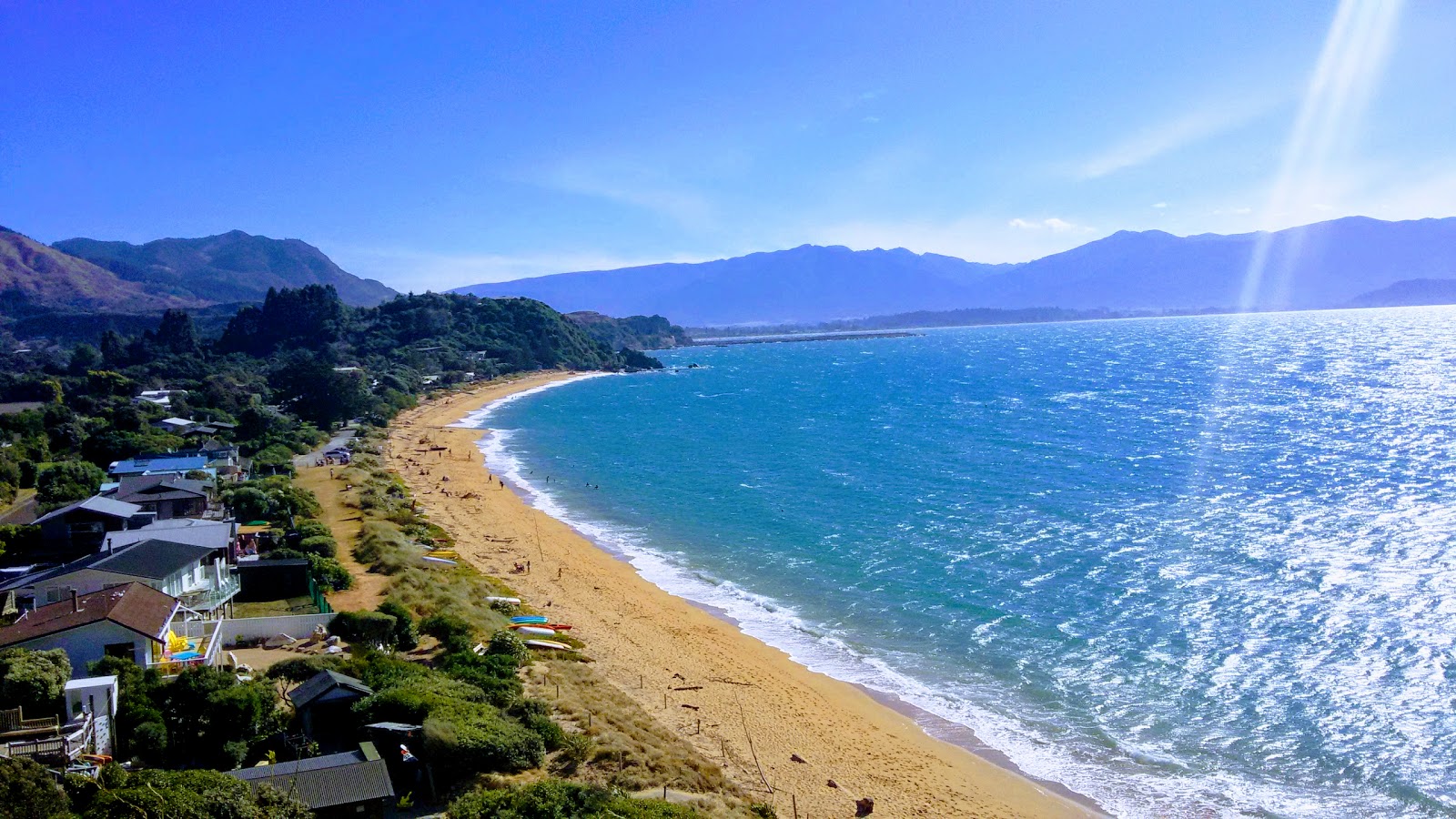 Photo of Tata Beach surrounded by mountains