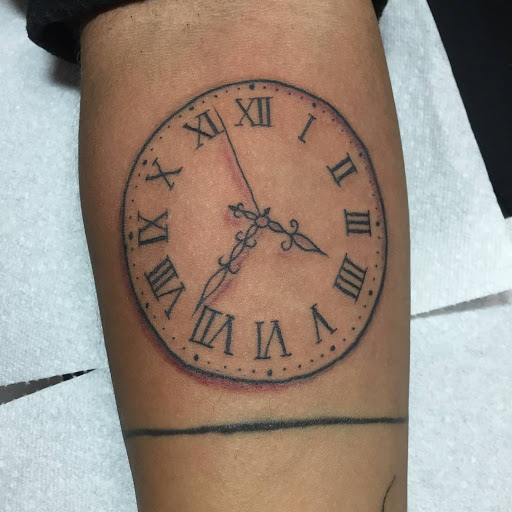 Explore valentine's day tattoo ideas, creative tattoo ideas in Frisco, available at Frisco Tattoo Company - Steel PaintBrush