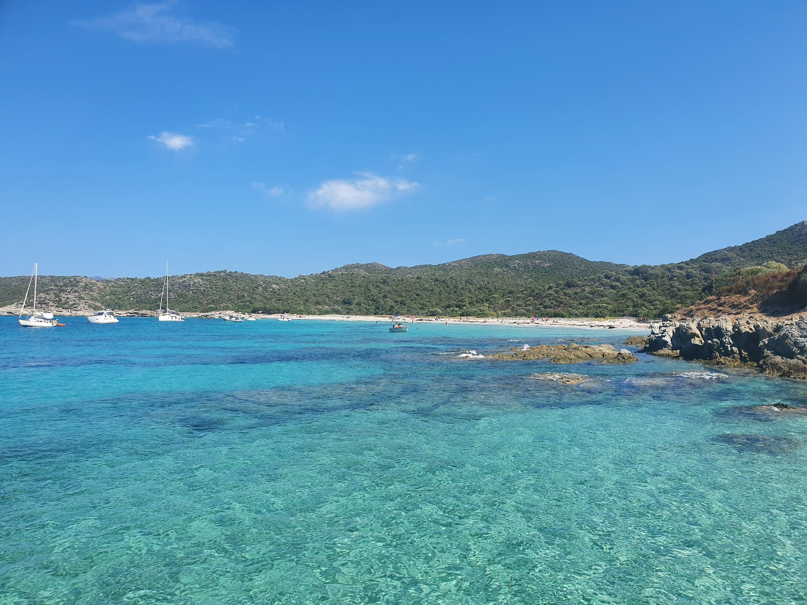 Foto von Plage Du Lotu mit feiner beiger sand Oberfläche