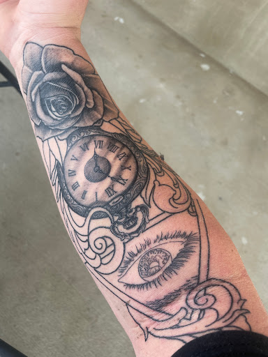 Explore koi sleeve tattoo ideas, creative tattoo ideas in Dickinson, available at Body Temple Tattoo Nd