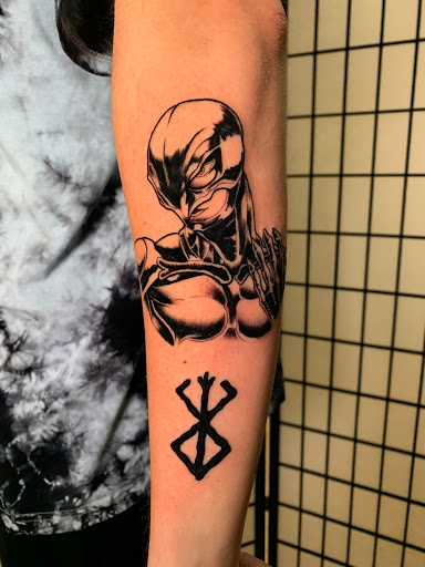 Explore male foot tattoo ideas, creative tattoo ideas in Arlington, available at Benchmark Tattoos