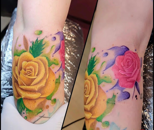 Explore apple tattoo ideas, creative tattoo ideas in Fort Wayne, available at Grade A Tattoos and Body Piercing