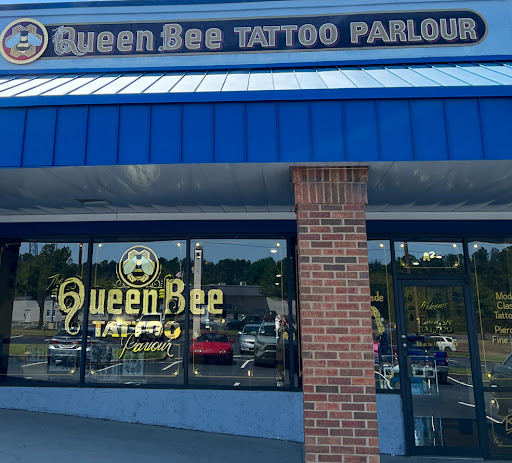 Explore simple silver lining tattoo ideas, creative tattoo ideas in Marietta, available at The Queen Bee Tattoo and Piercing Parlour