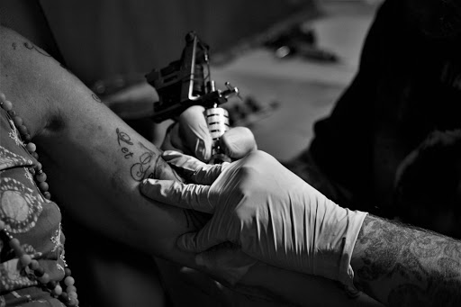 Explore chest tattoo filler ideas, creative tattoo ideas in Alton, available at Grand Piasa Body Art