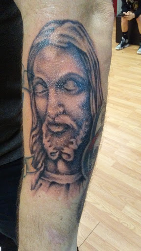 Explore garter tattoo ideas, creative tattoo ideas in Newark, available at Cruel Hand Tattoo