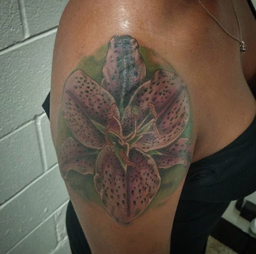 Explore peck tattoo ideas, creative tattoo ideas in San Diego, available at Sideshow Tattoo and Piercing