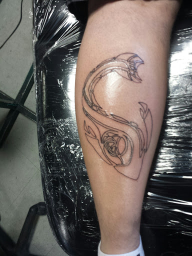 Explore rip tattoo ideas, creative tattoo ideas in Salt Lake City, available at SLC Ink Tattoo Salt Lake City, Utah