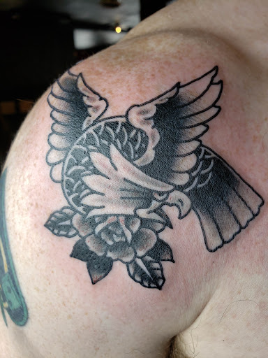 Explore hellscape battle sleeve tattoo ideas, creative tattoo ideas in El Paso, available at West Texas Tattoo