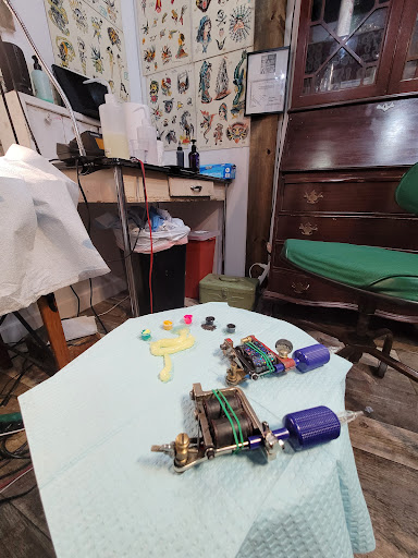 Explore disney tattoo sleeve ideas, creative tattoo ideas in Kansas City, available at Grimm Tattoo and Bert Grimm Museum