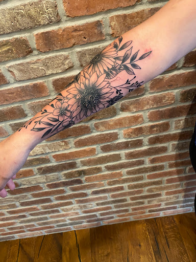 Explore dog tag tattoo ideas, creative tattoo ideas in Sauk City, available at The Madison Tattoo Company