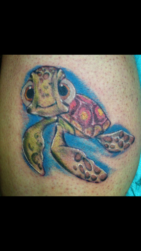 Explore blue flame tattoo ideas, creative tattoo ideas in Rehoboth Beach, available at Homeward Tattoo and Body Piercing