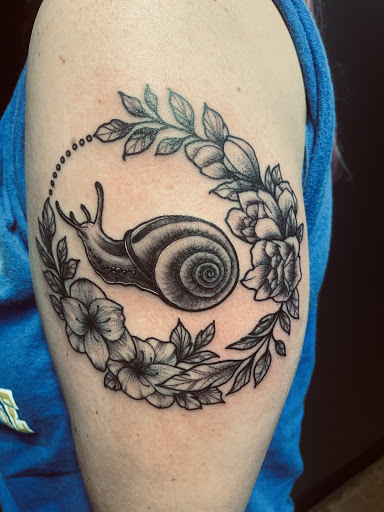 Find female rib tattoo ideas for your next unique tattoo in Johnson City at Little Chicago Tattoo Company LLC