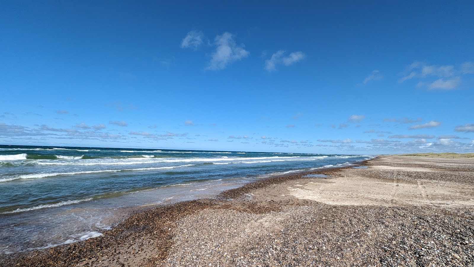 Foto av Tranum Beach och bosättningen