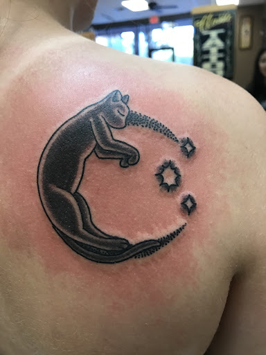 Find small wolf tattoo ideas for your next unique tattoo in Chandler at Classic Tattoo