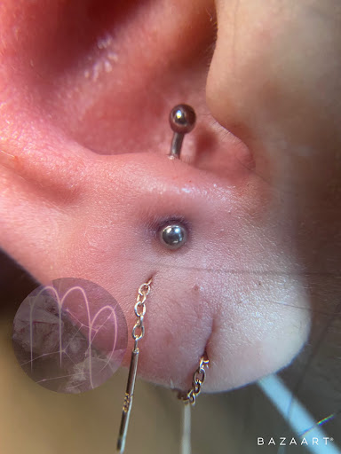 Explore small flowers tattoo ideas, creative tattoo ideas in Denver, available at Disruptive Ink Tattoos