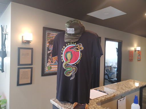 Explore chest plate tattoo ideas, creative tattoo ideas in Albany, available at Dead Presidents Lounge