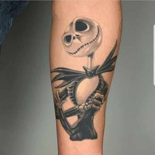 Explore side face tattoo ideas, creative tattoo ideas in Odessa, available at Black Cat Tattoo Company