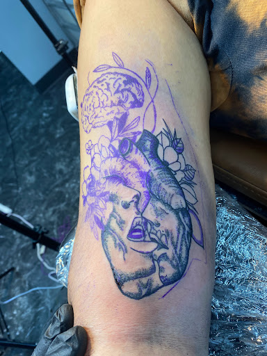 Explore tattoo ideas for men forearm, creative tattoo ideas in Dayton, available at Uppity Tattoos