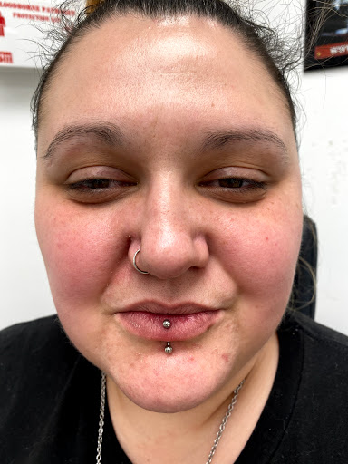 Explore throat tattoo ideas for males, creative tattoo ideas in Myrtle Beach, available at Professional Body Piercing by Jackie