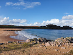 Foto van Firemore Beach met recht en lang