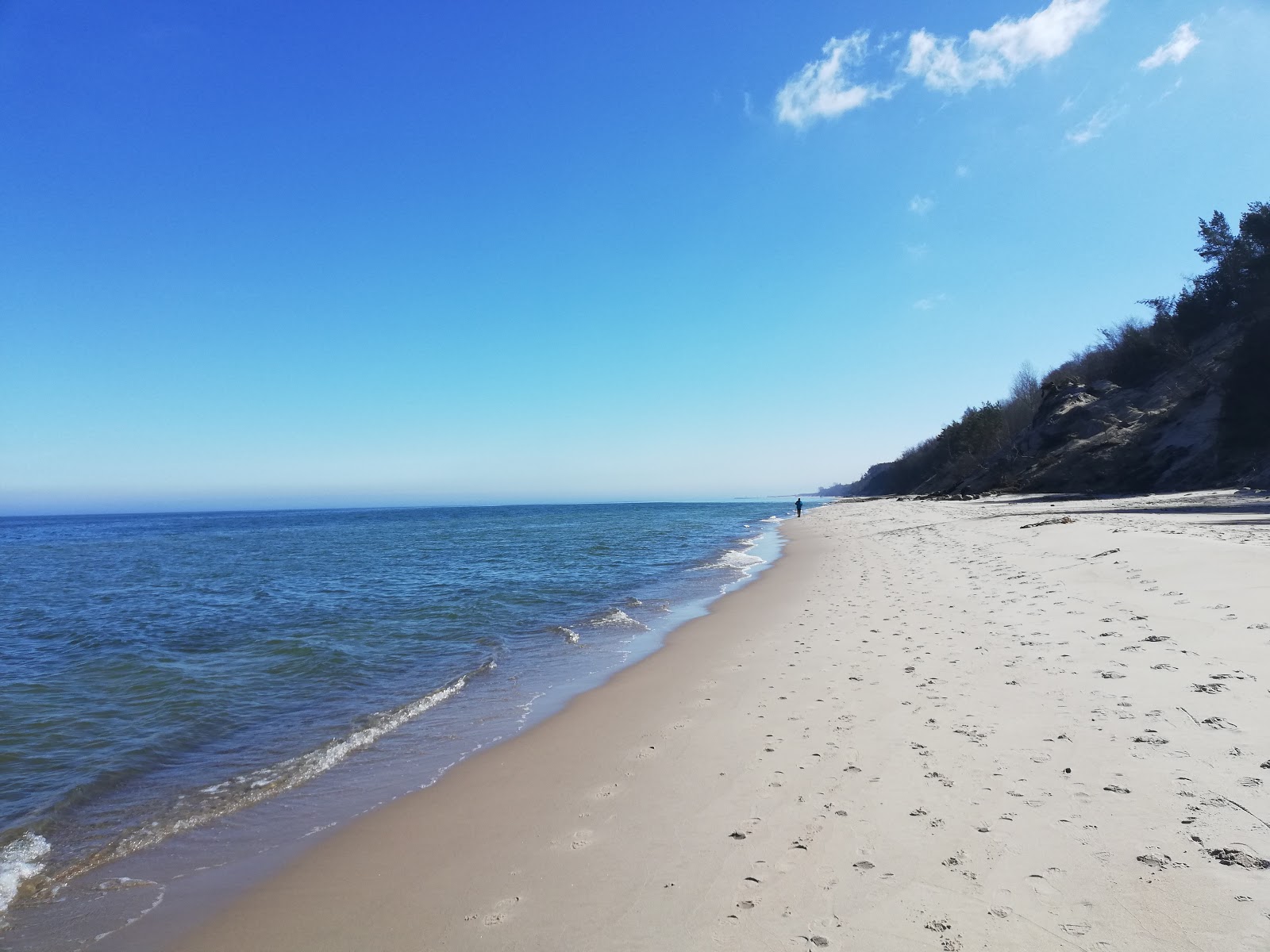 Photo de Rozewie Beach avec l'eau cristalline de surface