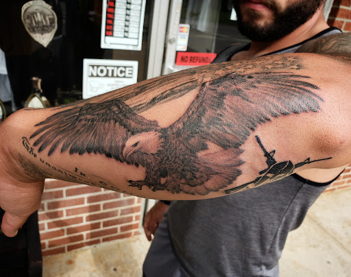 Explore neck tattoo idea, creative tattoo ideas in Harriman, available at Sunbright Tattoo Factory